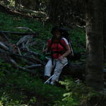 Peggy found a great log to sit on.