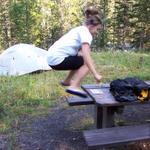 Lindsay can jump from the ground and land on top of the table.