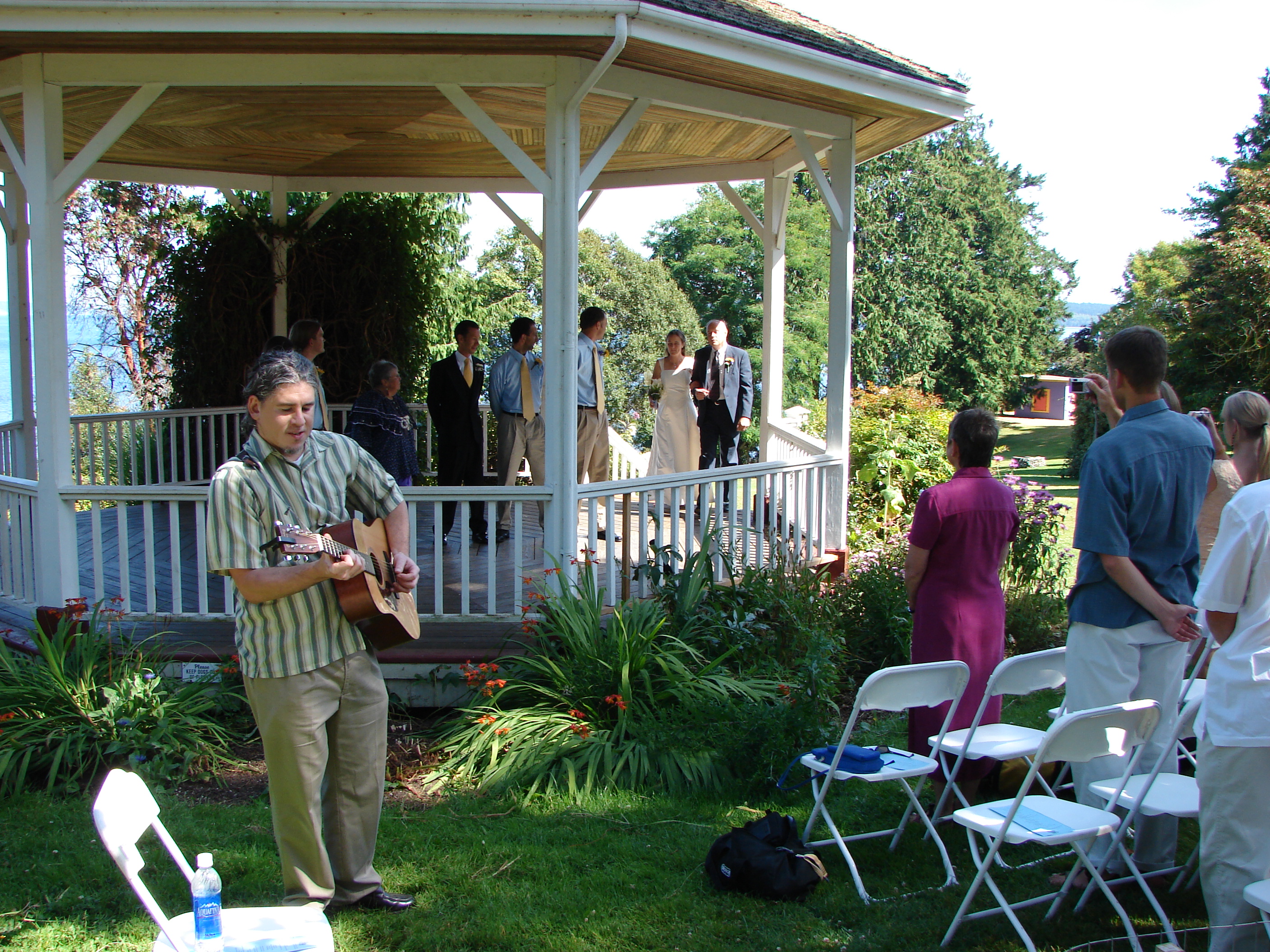 Mike plays "Brown-eyed Girl" as Lindsay enters.