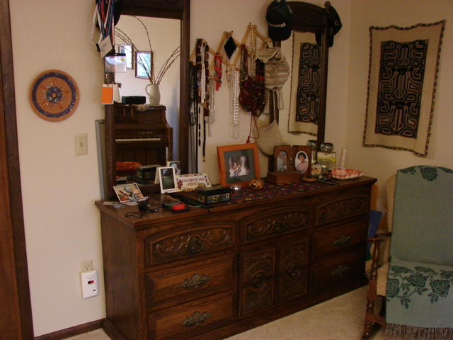 JJ and I bought the dresser when we were first married.  Most of the little boxes have been gifts.  The pink plate was my mom's.