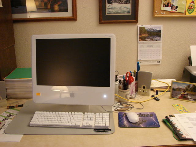 My lovely computer.  One of the pencil holders was bought at the Metro Store in Madrid after much searching for the store.