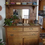 LW's cupboard.  Bowls from Malta from C & C.  Vinegar and oil pitchers from Spain, Hórreo from Spain-JJ might want it, table