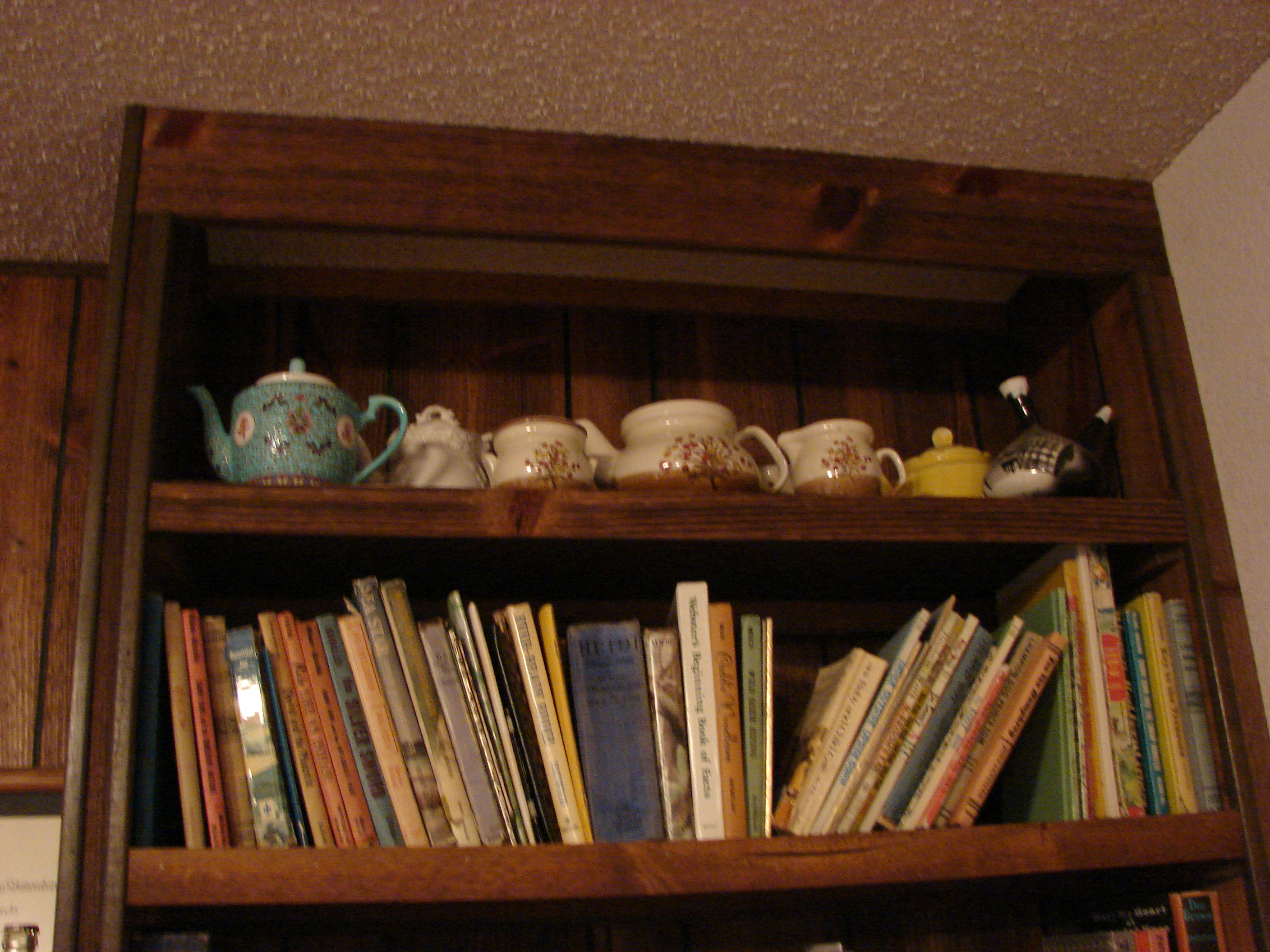 Brown teapot and cups were gift from women in Berville, MI, when we moved.  Other teapot was bought in San Francisco.