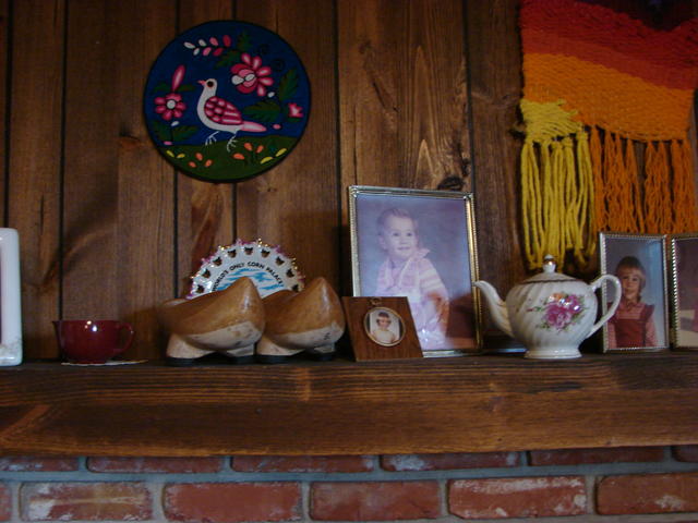 Wooden shoes from Spain, picture of Lindsay in dress I crocheted for her, Chris made the yarn wall hanging, I bought the teapot.