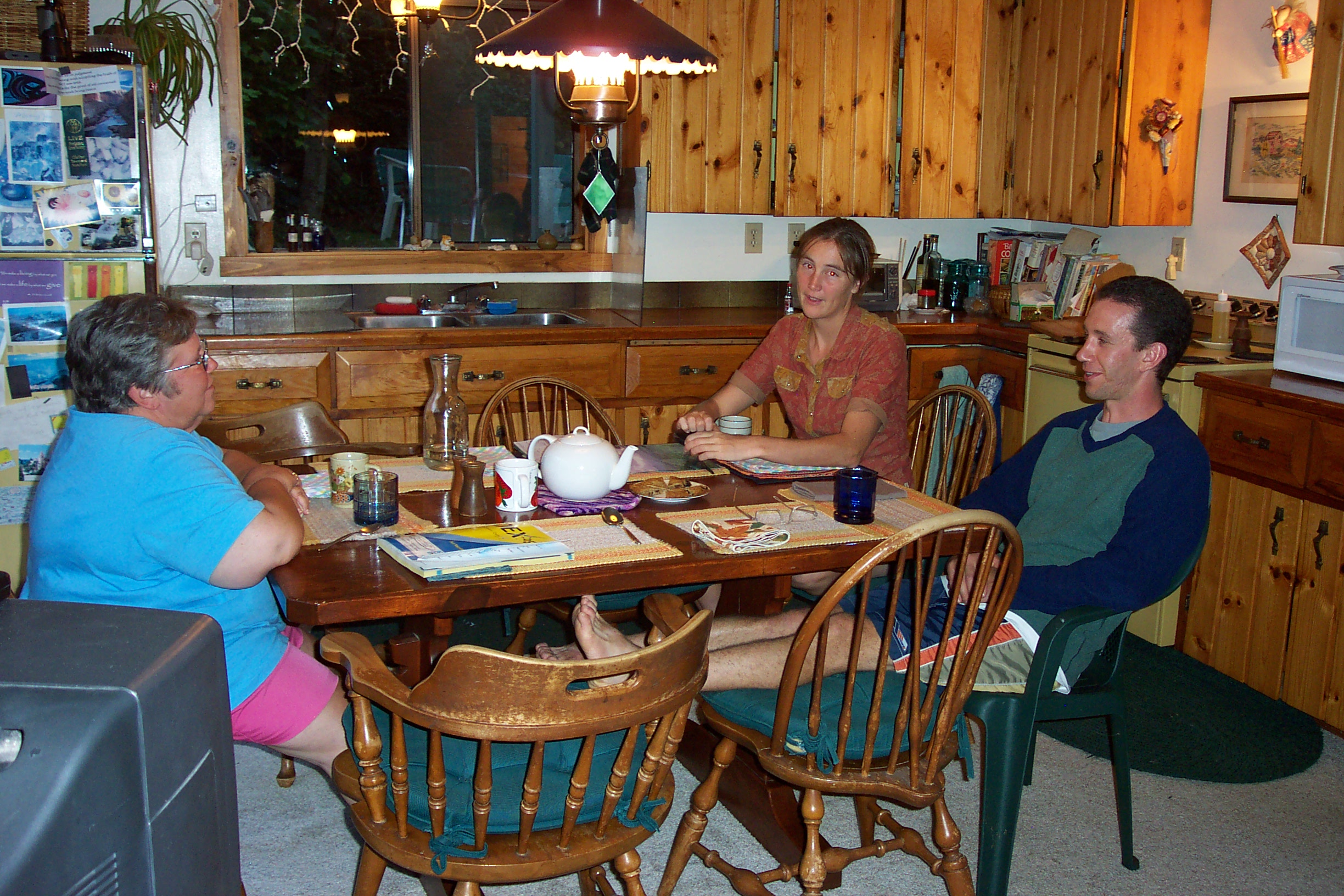 Here Lindsay and Ben sit with Susan in the kitchen as they discuss the wedding ceremony.