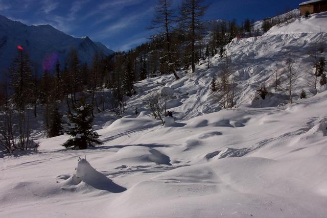 While Linda skied here, I was snowplowing down the cat track.