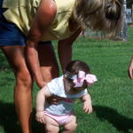 Judy is teaching Kylie to walk.  It's the first time Kylie has touched grass!